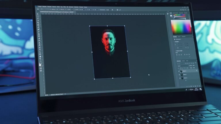 Graphic design software open on a laptop screen