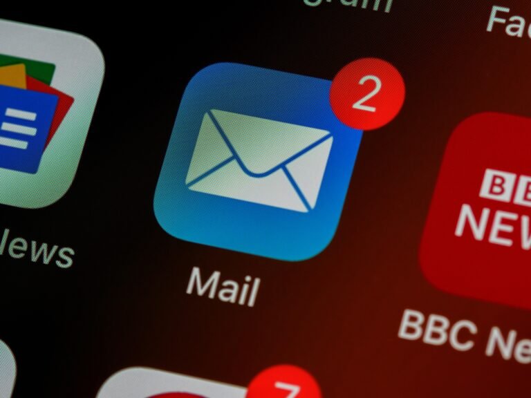 Phone screen with the Mail app icon and notification badge