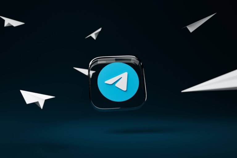 Telegram logo with paper planes on a dark blue background