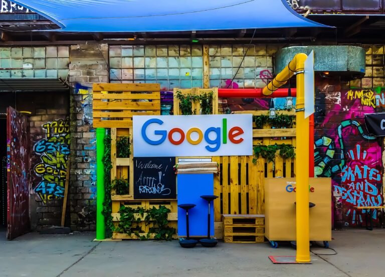 Google sign on a colourful graffiti-covered building