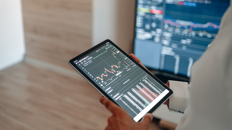 Interactive business dashboard with charts and graphs on computer monitor
