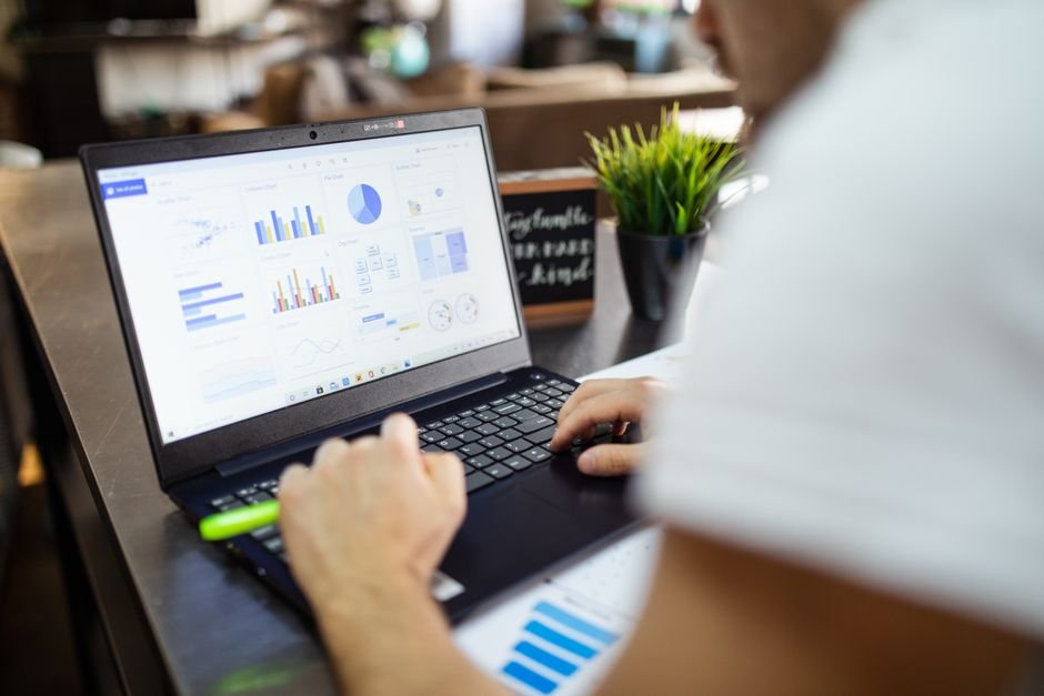 Close-up of spreadsheet tracking AI tool performance metrics