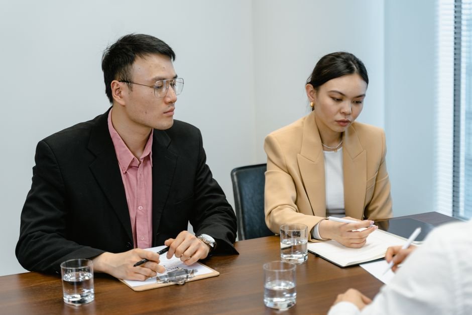Small business team conducting a job interview with candidate