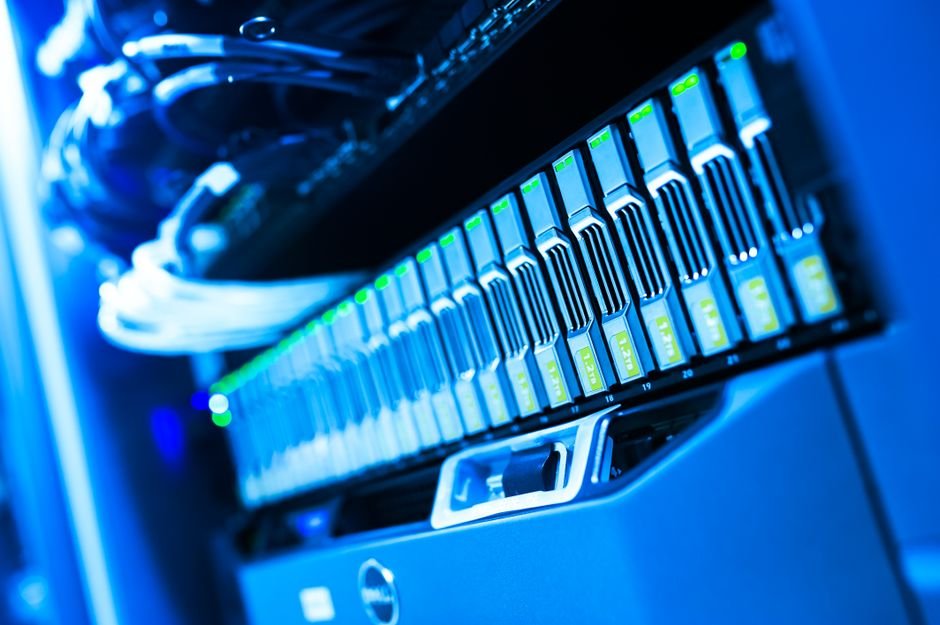 Person organising data in a digital database on computer screen