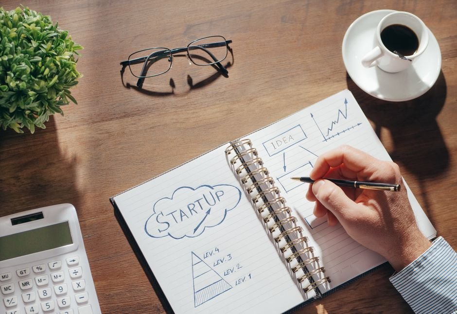 Small business owner organizing tasks and projects at desk