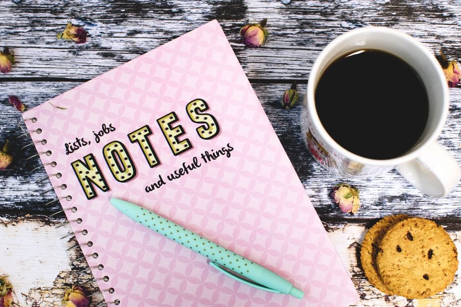 Notebook and pen for organising job application notes